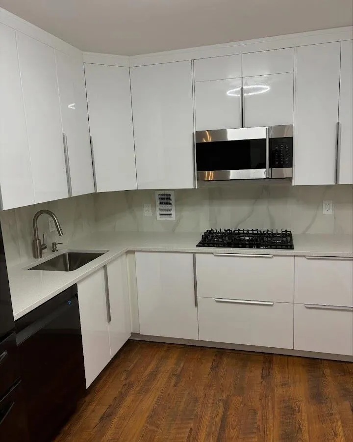 Restored kitchen with white cabinets after water damage in Trenton